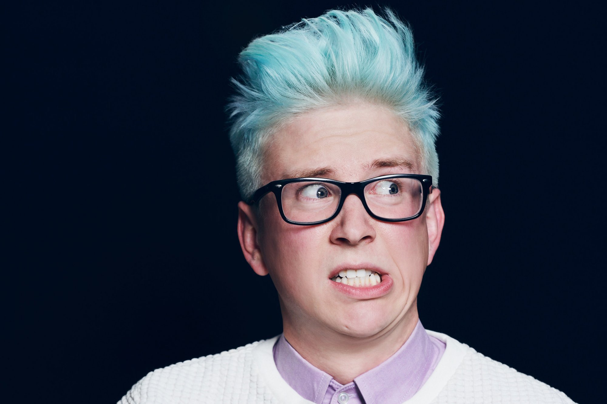6. Tyler Oakley's blue hair: a symbol of self-expression - wide 4