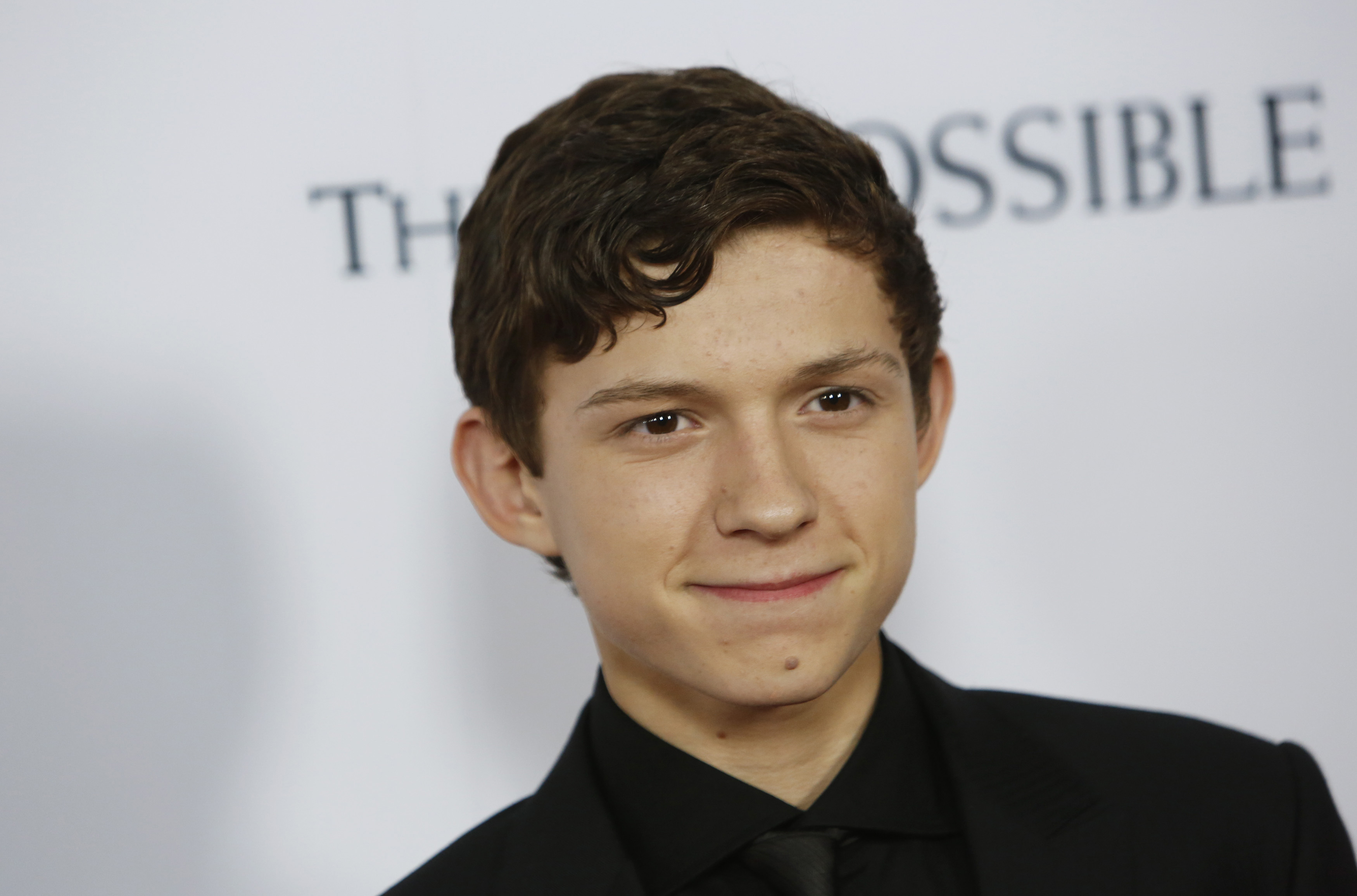 Actor Tom Holland Arrives At The Premiere Of The Movie "The Impossible" At Arclight Cinema In Hollywood