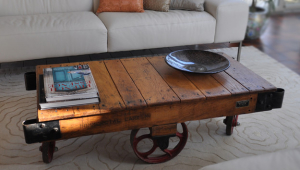 Rustic End Table With Decorative Wheel