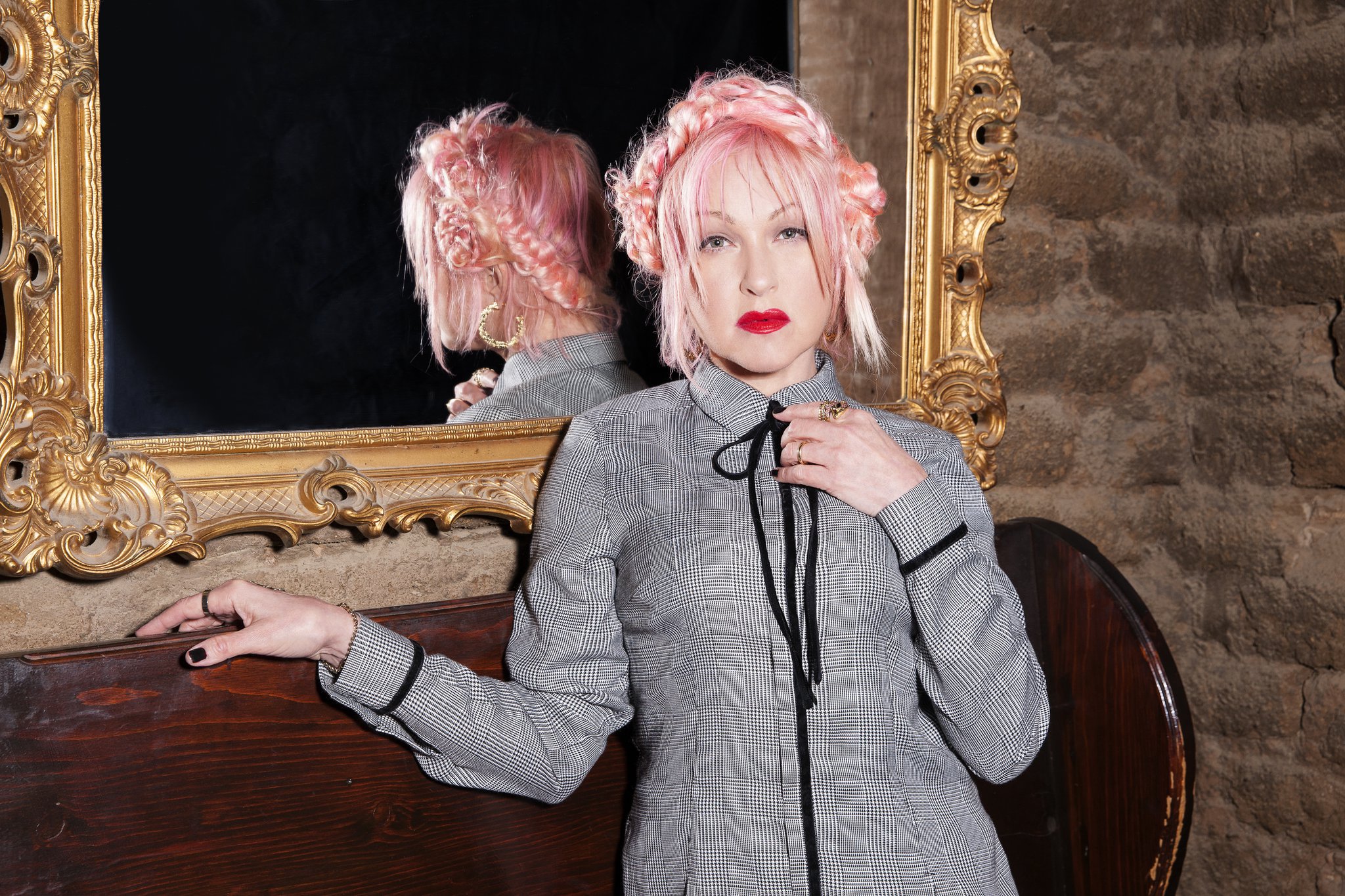 You can search within the site for more Cyndi Lauper Images. 